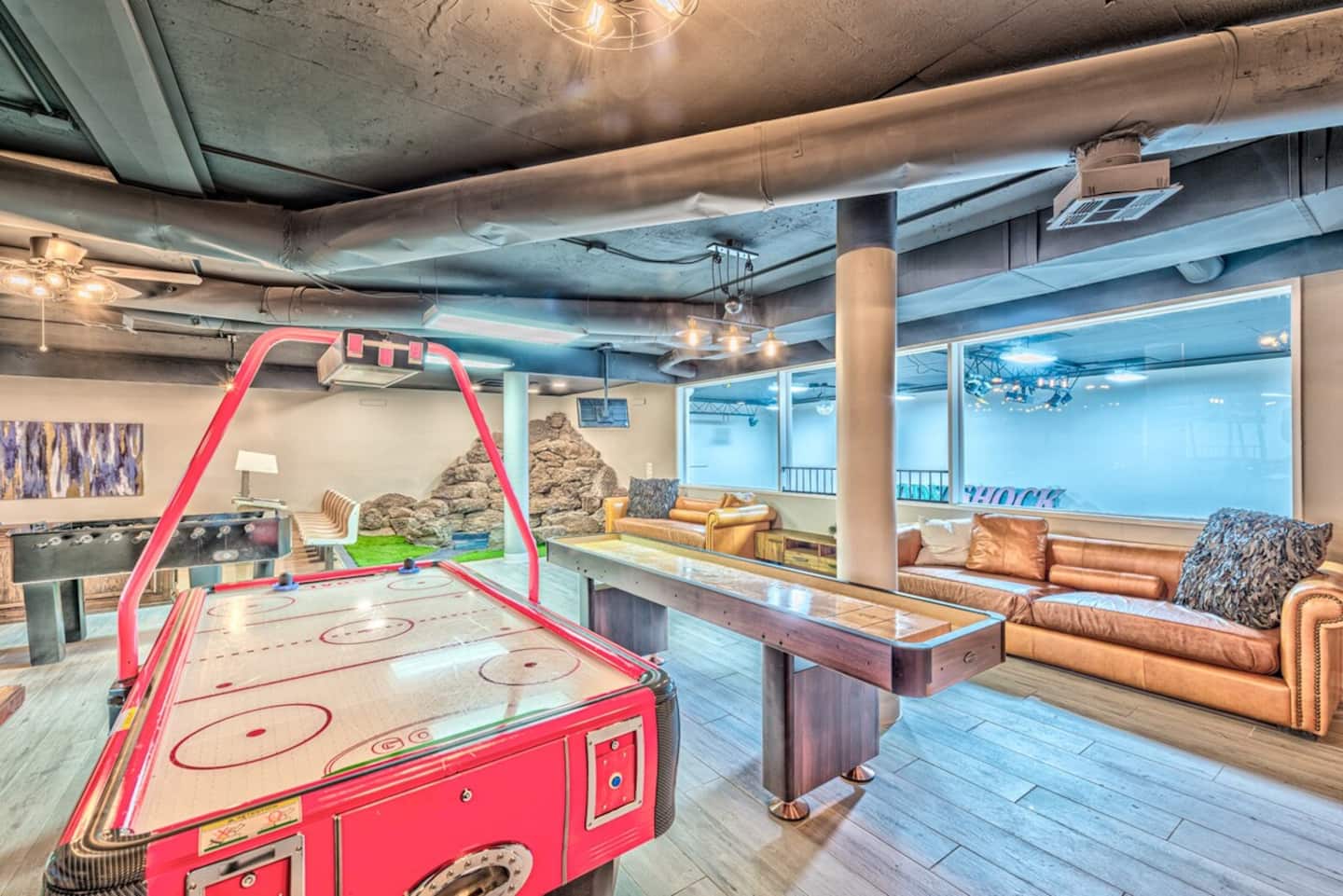 Enjoy the entertainment center inside the Bowling Villa. This dedicated space is equipped with high-quality tables, including professional Air Hockey, Shuffleboard, and Foosball, guaranteeing non-stop